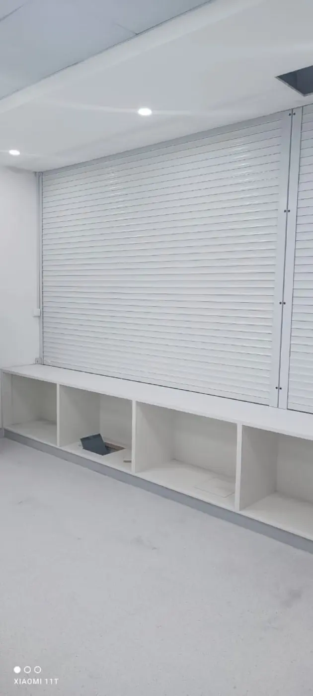 Roller blinds installed in a Sharjah office