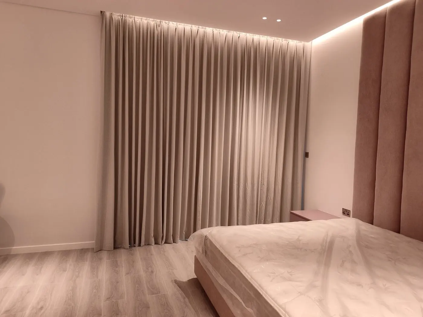 Custom blackout curtains fitted in a Sharjah bedroom by Al Noor Curtains